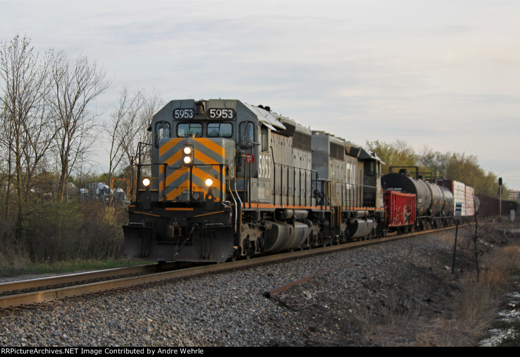 GTW 5953 leads sister 5944 on a northbound rock train with a little bit of general freight up front